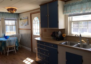 2 Bedroom ranch located in the heart of Pine Point steps to white sandy beach.