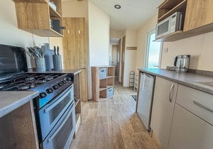 6 berth caravan with decking at Felixstowe Beach Holiday Park ref 55038OW