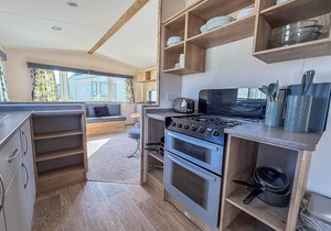 6 berth caravan with decking at Felixstowe Beach Holiday Park ref 55038OW