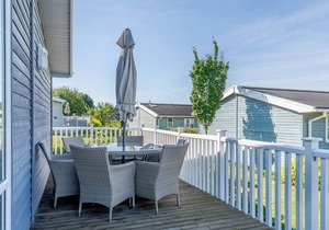 A Nordic Style 6 berth Luxury Lodge with raised veranda on 3 sides.