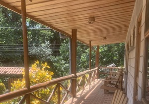 A rustic lodge surrounded by gardens, in a jungle setting - double Room 1