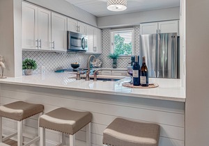 Beautifully Renovated 2 BR Villa! Neighborhood Pool! Amenity Cards Included!