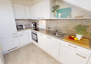 Bright, modern 2-room vacation apartment for 4 people with balcony by the Baltic Sea