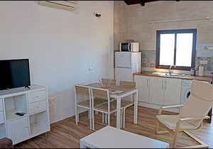 Bungalow with shared pool and garden