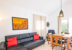 C3, in a small complex with communal heated pool 100m from the sea