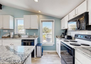 Canal-Front Home w/Deck, Washer/Dryer, Free WiFi, Outdoor Dining Area, & More