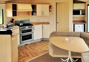 Comfortable and spacious 12ft-wide caravan with one double and two twin.