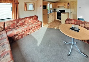 Comfortable and spacious 12ft-wide caravan with one double and two twin.