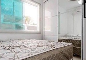 Complete two-bedroom apartments, five minutes' walk from the sea.