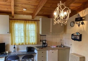 Cottage with 1 Bedroom, 2 Bathroom Heated solar Pool, Sauna, Jacuzzi Garden