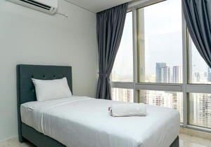 Cozy 2BR @ The Masterpiece Condominium Epicentrum Apartment By Travelio
