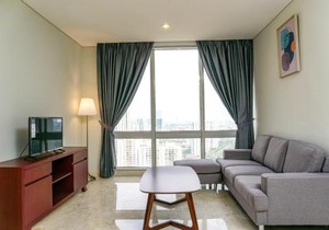 Cozy 2BR @ The Masterpiece Condominium Epicentrum Apartment By Travelio