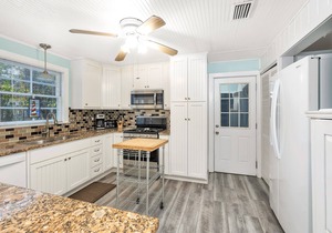 Delightful Pet Friendly Cottage in East Beach Neighborhood with Swimming Pool