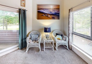 Dog-friendly condo with pool plus lake, canal & golf course views