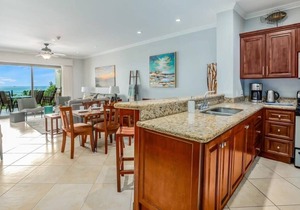 Elegant Oceanview Condo with Spacious Open-Concept Floor Plan and Inviting Beach