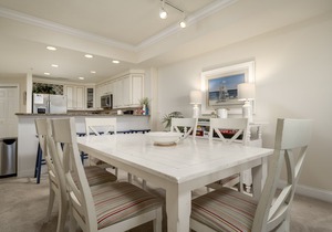 Enjoy a large, spacious designer unit with all the extras plus an indoor pool, outdoor pool, fitness room, assigned parking and shops on the ground level.