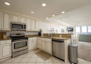 Enjoy a large, spacious designer unit with all the extras plus an indoor pool, outdoor pool, fitness room, assigned parking and shops on the ground level.