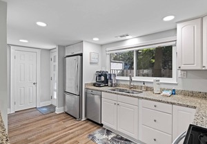Enjoy a walk to the beach from this renovated, pet friendly end-unit villa.