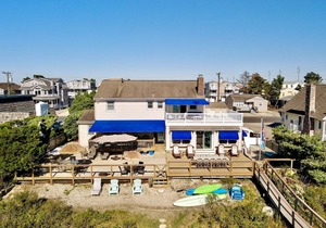 ENJOY BAY VIEWS! Bayfront home, shady front porch 2 boat docking areas, gameroom to watch TV, A short bike ride or walk to Avalon's fine business district for ice cream, dining, mini golf, shopping and more.