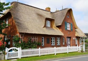 Ferien unterm Reetdach Whg 03