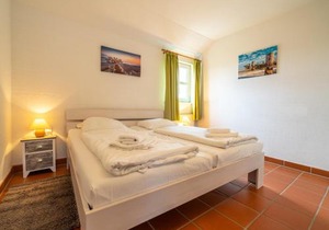 Feriendorf Rugana - Komfort Appartement mit 2 Schlafzimmern und Terrasse D03