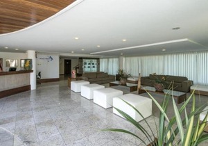 Flat no Blue Marlin Resort Com linda vista do jardim por Carpediem