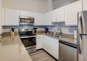 Frontdesk | 2 BR Apt by Kurt Vonnegut Library