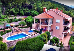 Holiday apartment with balcony and sea view