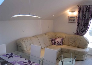 Holiday apartment with air conditioning and balcony near the beach