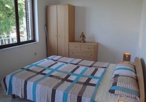 Holiday apartment with air conditioning and terrace with sea view