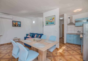 Holiday apartment with balcony and air conditioning