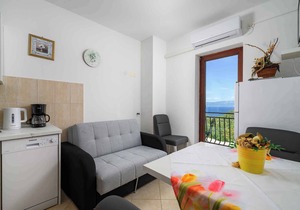 Holiday apartment with sea view and pool