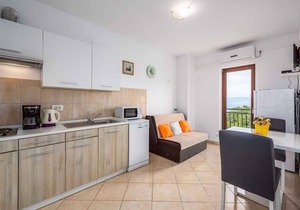 Holiday apartment with sea view and pool