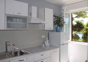 Holiday apartment with terrace and sea view