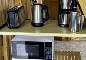 Holiday house with 3 bedrooms directly on the Useriner See with bathing beach, fireplace