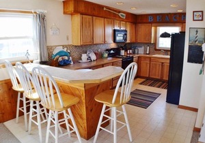 Imagine sitting on the deck in the morning watching the dolphins play in the ocean!