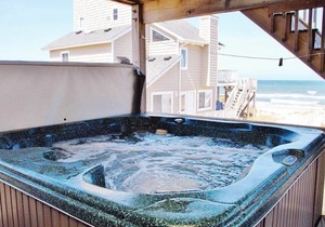 Imagine sitting on the deck in the morning watching the dolphins play in the ocean!