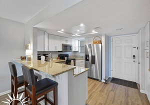 Island South 27- Updated, Spacious 2 bedroom condo with ocean view, pool and