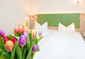 Kleines Doppelzimmer - Ferienzimmer und -wohnungen mit Seeblick