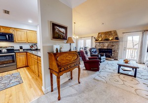 Lakefront condo with wood-burning fireplace, WiFi, two decks, & great views