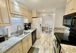 LINENS INCLUDED*!. Best of both worlds! This unit features spectacular views of the ocean and also of the peaceful Lake Gerar.