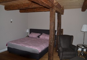 Living in the mill building, surrounded by green meadows.