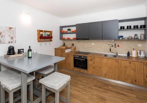 Look forward to a sunny semi-detached house with barbecue and large open terrace.