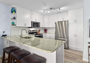 Lovely 2 br on bay with pool, and walking distance to beach and boardwalk!