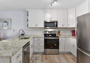 Lovely 2 br on bay with pool, and walking distance to beach and boardwalk!