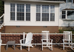 Luxury accommodation overlooking Lake Otsego with private waterfront. 11 rooms.