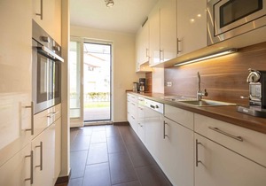 Luxury apartment with sauna, corner bath, fireplace, wireless, beach chair on patio