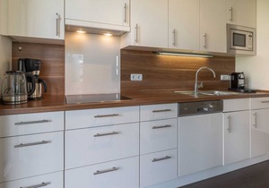 Luxury apartment with sauna, corner bath, fireplace, wireless, beach chair on patio
