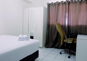Minimalist 1BR with City View The Wave Apartment By Travelio