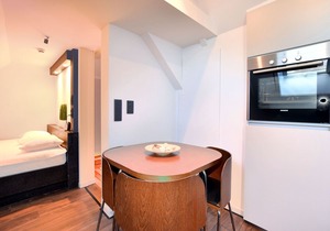 Modern and cozy studio in a former coach house